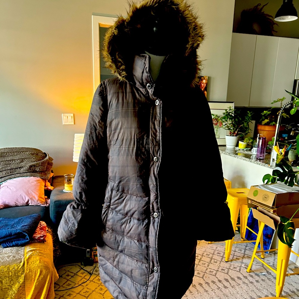 Full length puffer jacket with a large hood. Only word twice!